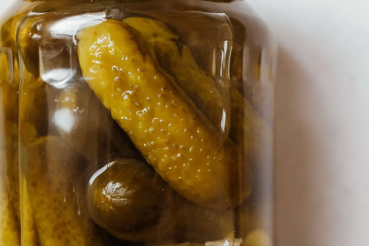Gherkins in brine in a glass jar