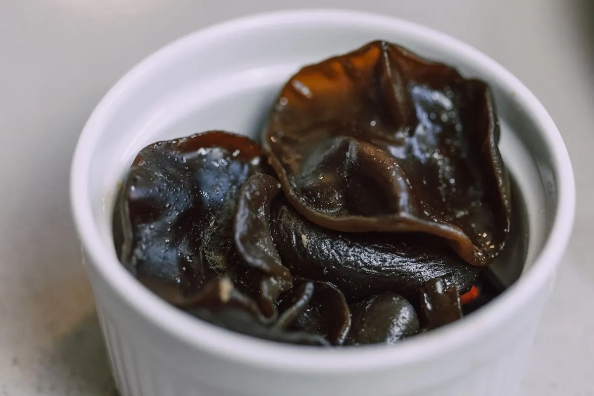 Black wood ear fungus in a white ceramic ramekin