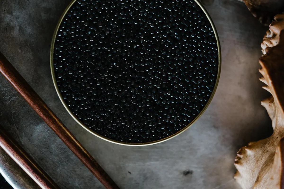 Black sturgeon caviar in a round tin