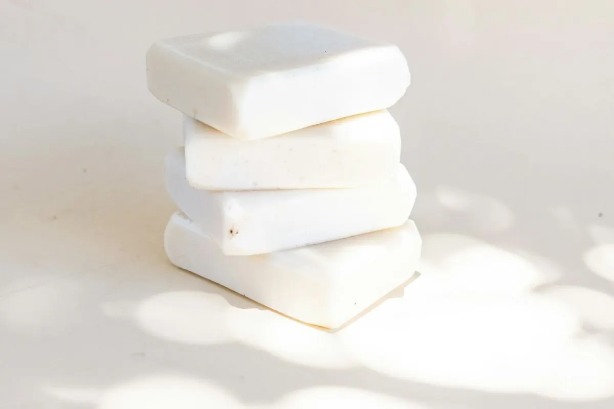 Stack of plain white soap bars