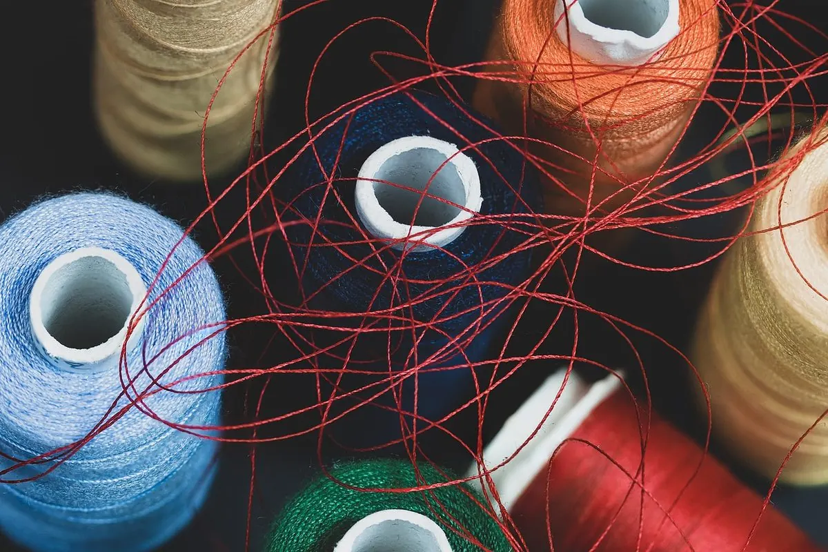 Cotton thread spools in several colours