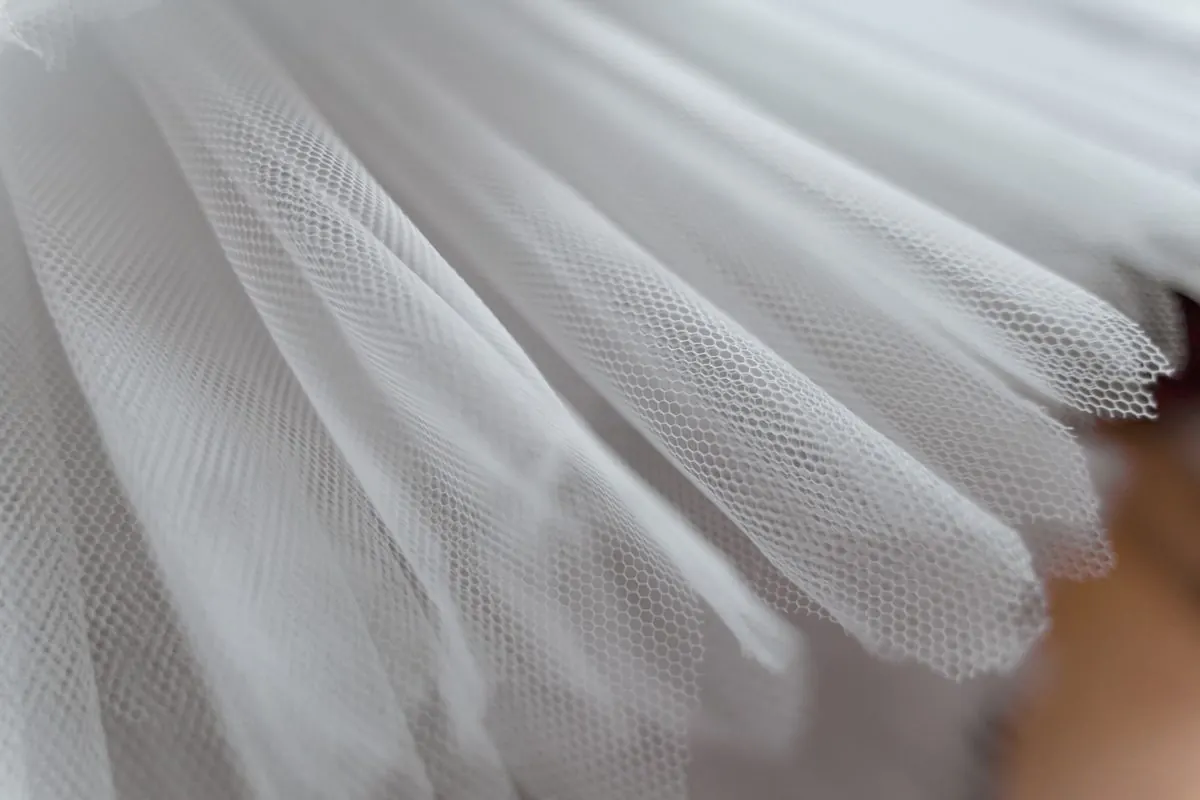 Close-up of pleated white tulle net fabric