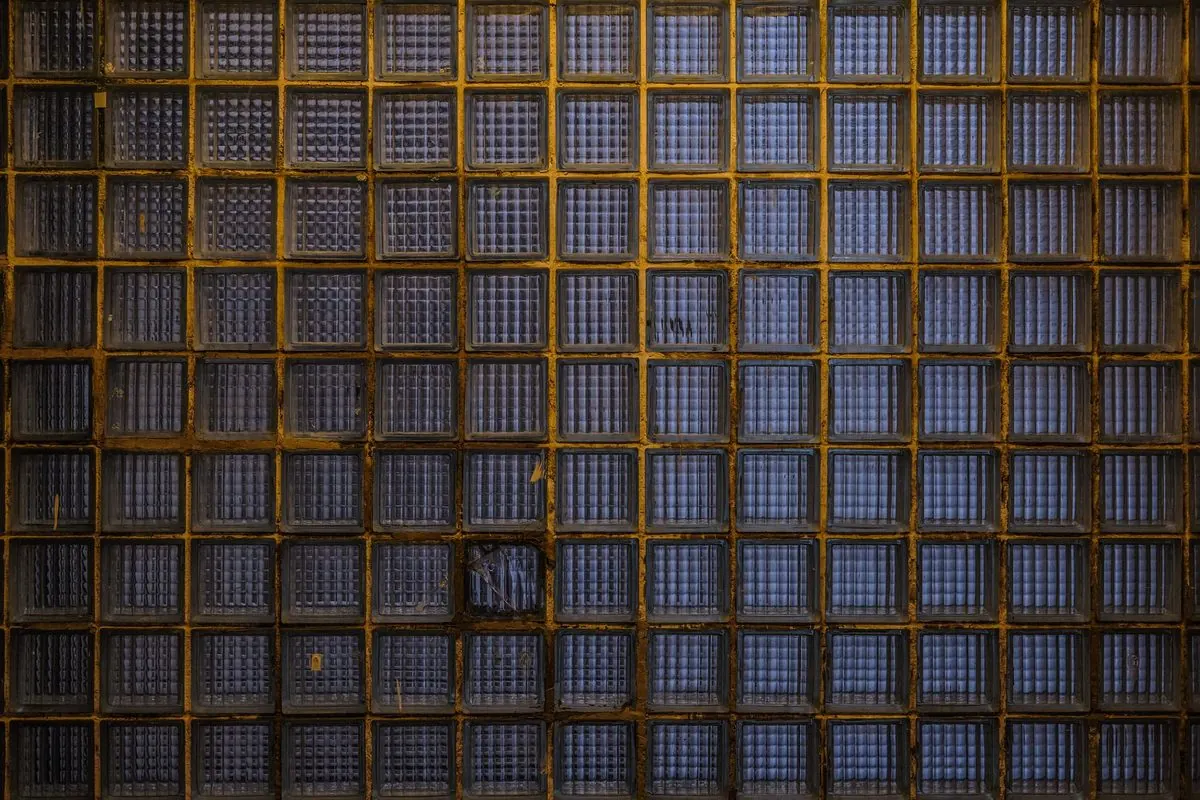 Wall built from square glass blocks