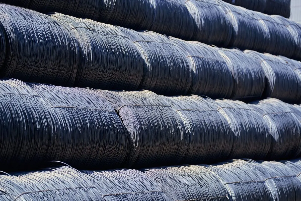 Stacked hot-rolled steel wire rod coils outdoors