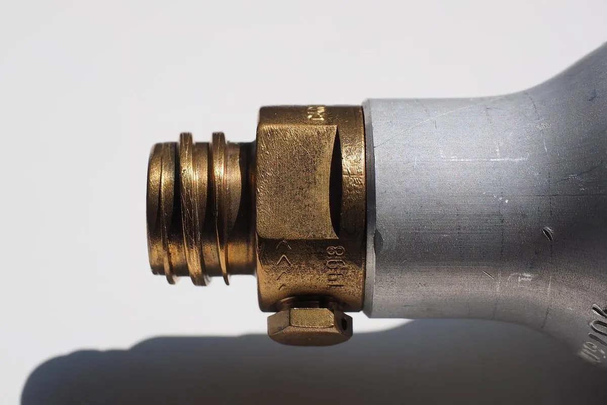Brass valve on a silver gas cylinder
