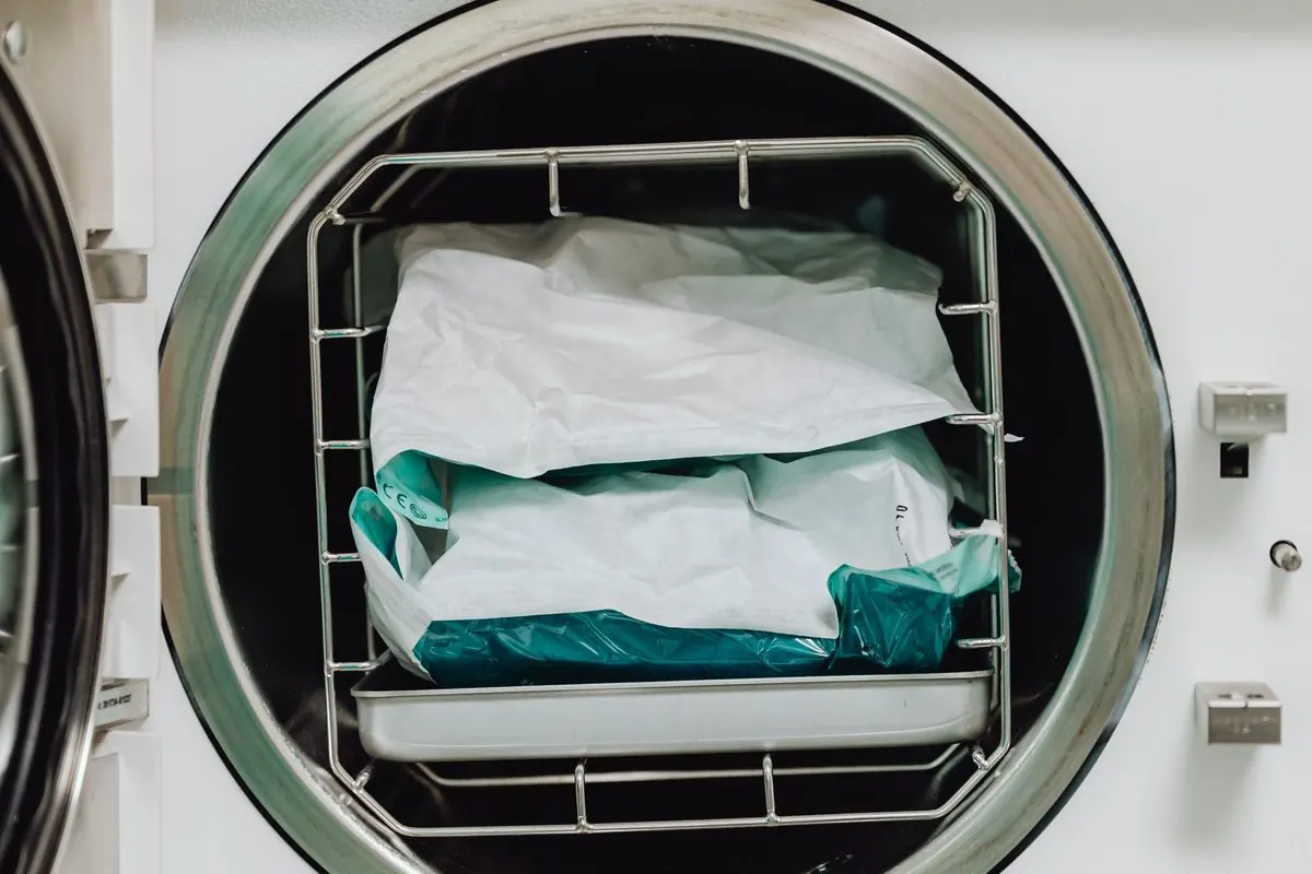 Open medical autoclave with wrapped instruments inside