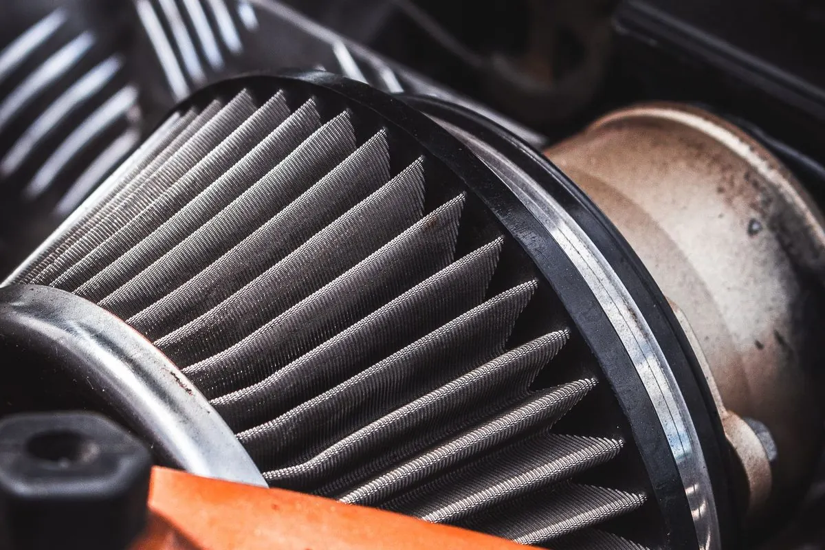 Pleated engine air filter element in an engine bay