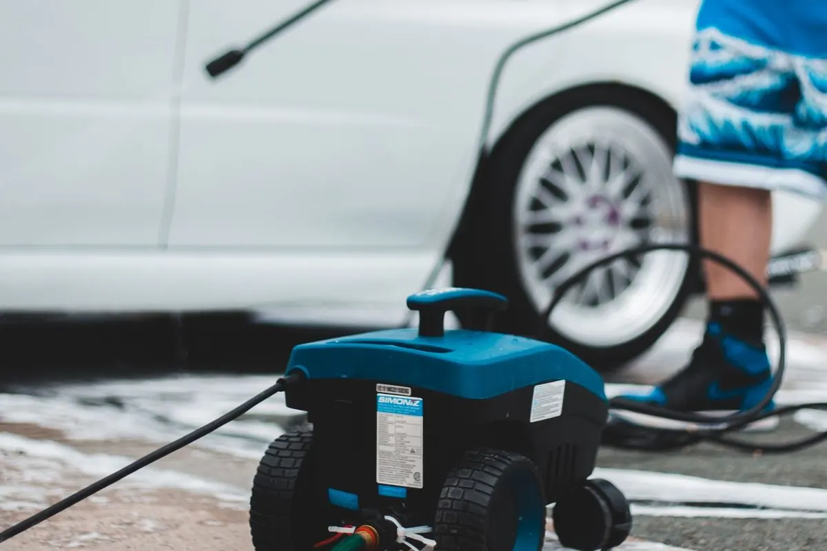 Pressure washer unit on a sidewalk