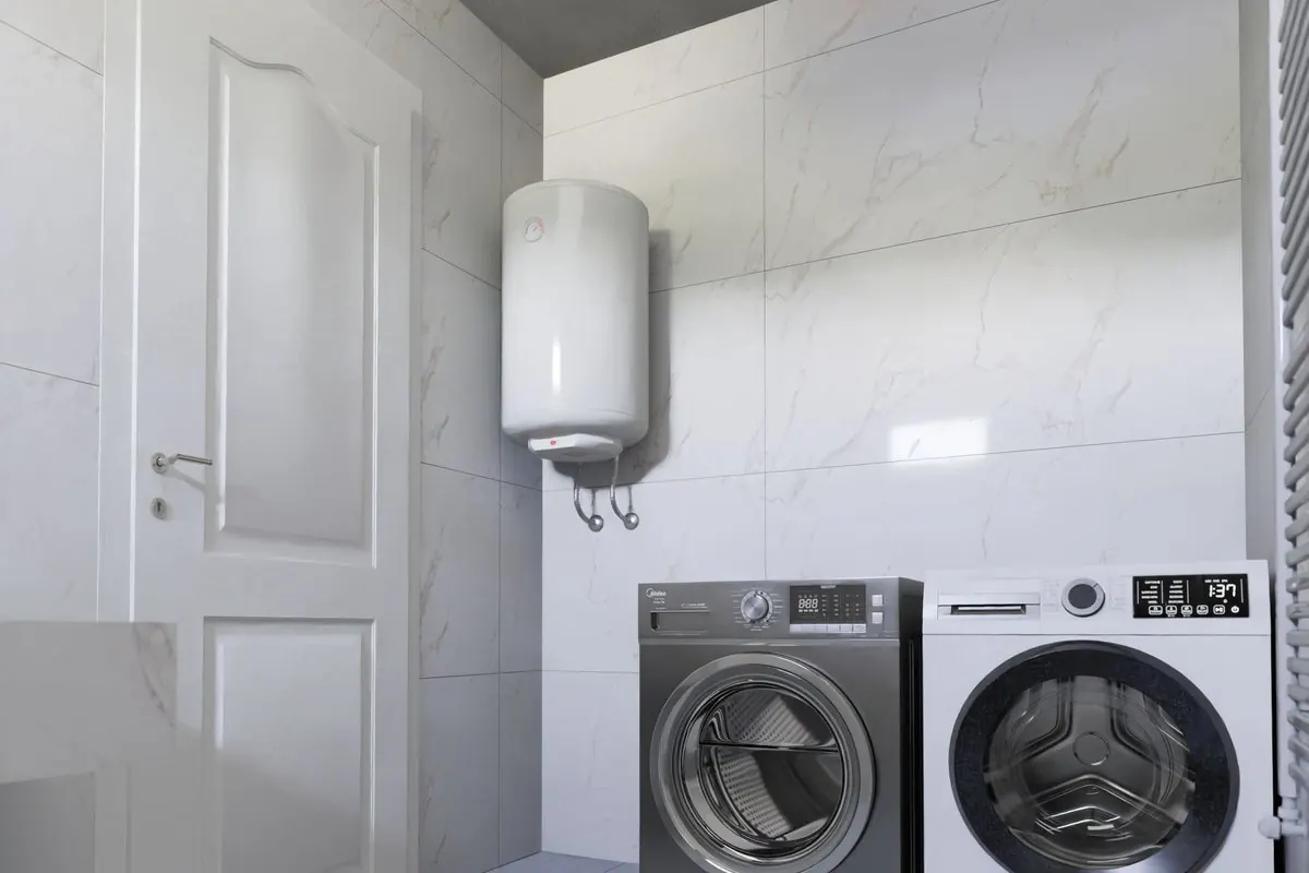 Bình nóng lạnh treo tường trong phòng tắm, bên dưới là máy giặt