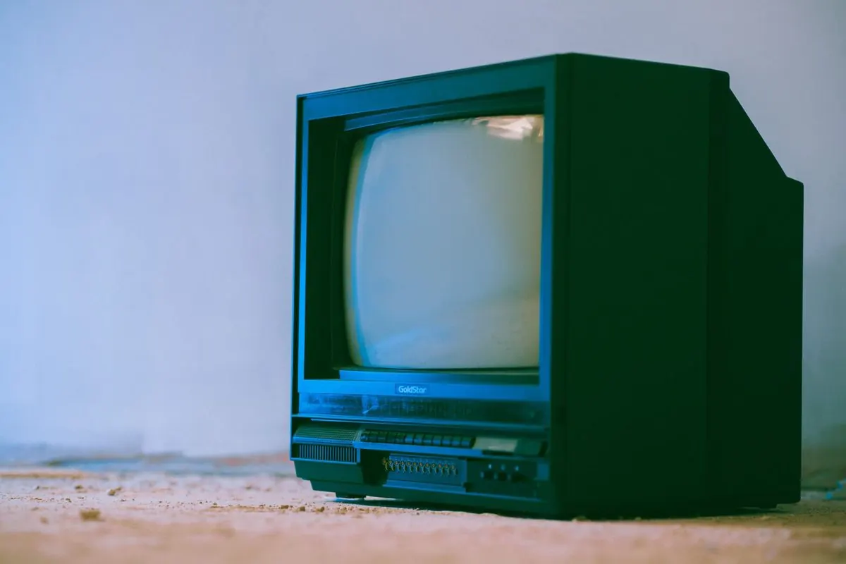 Old CRT television on a rough floor