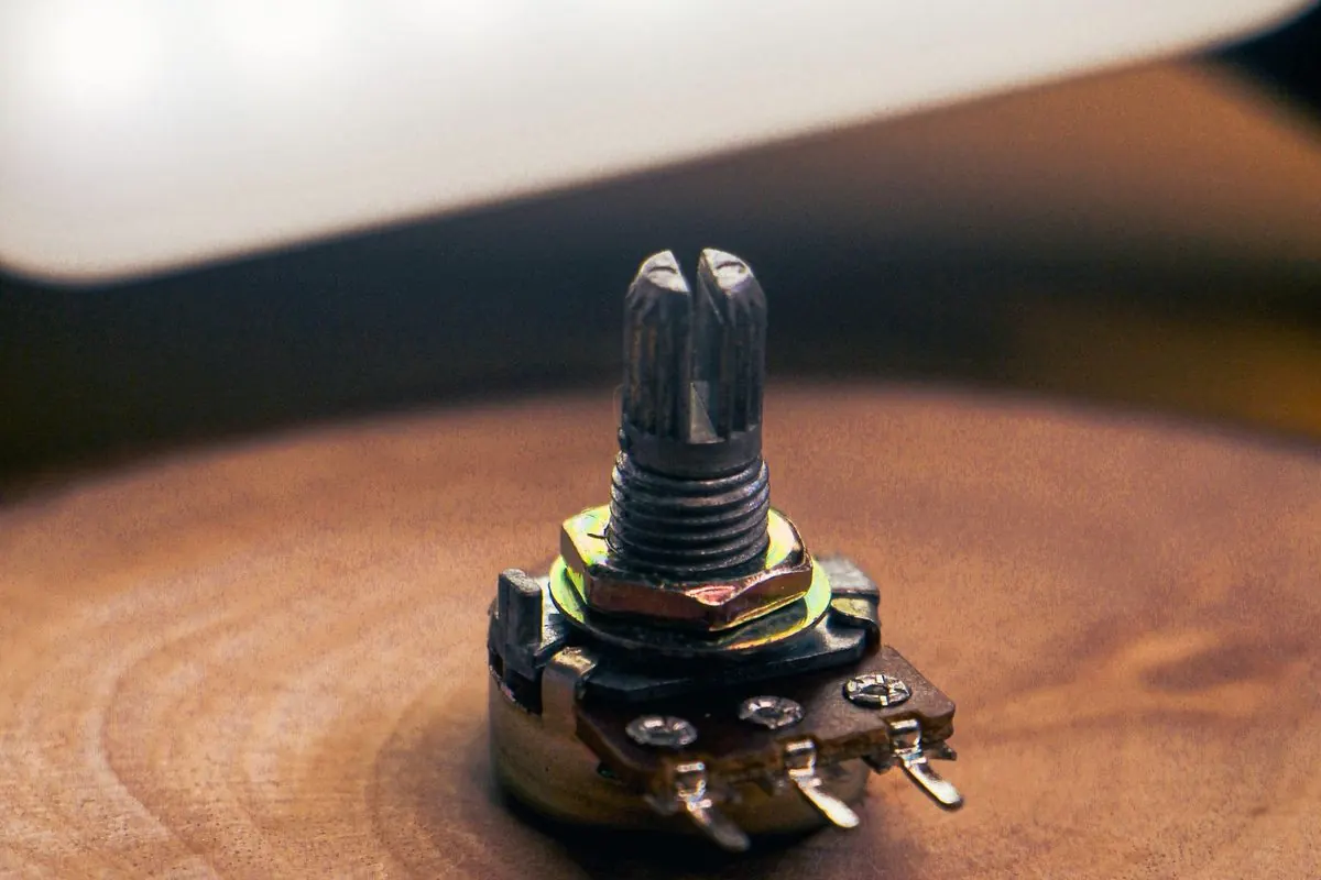 Potentiometer standing on a wooden surface