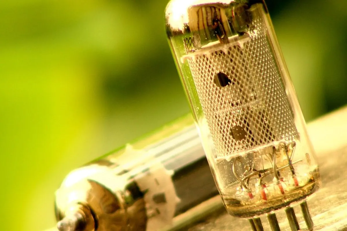 Two glass vacuum tubes with base pins