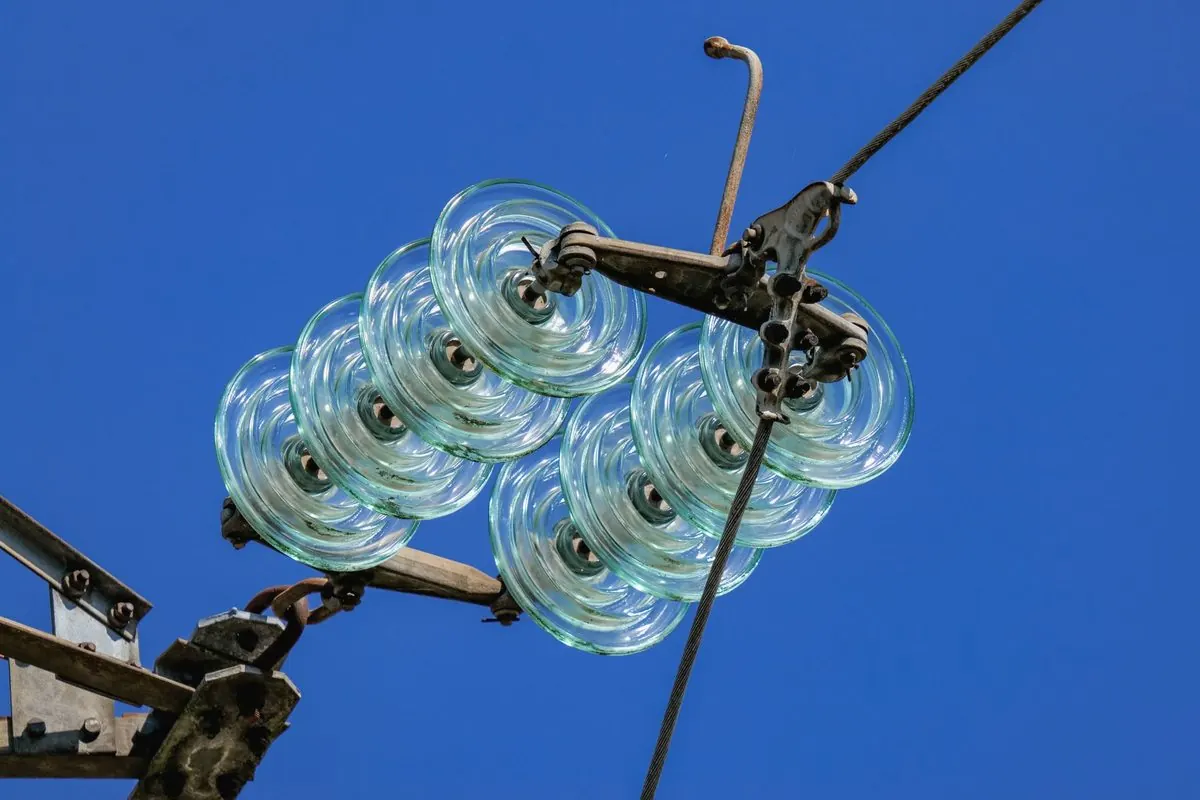 Glass insulator string on a high-voltage power line