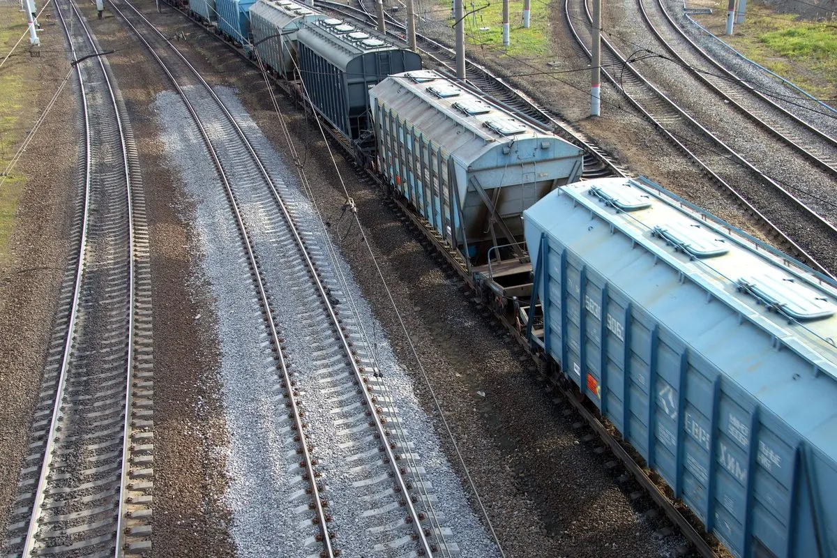 Aerial view of a train of covered freight wagons