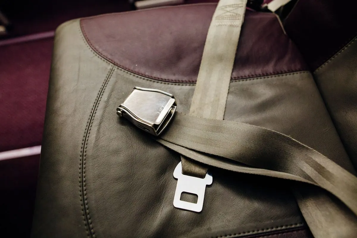 Seat belt and buckle on a leather car seat