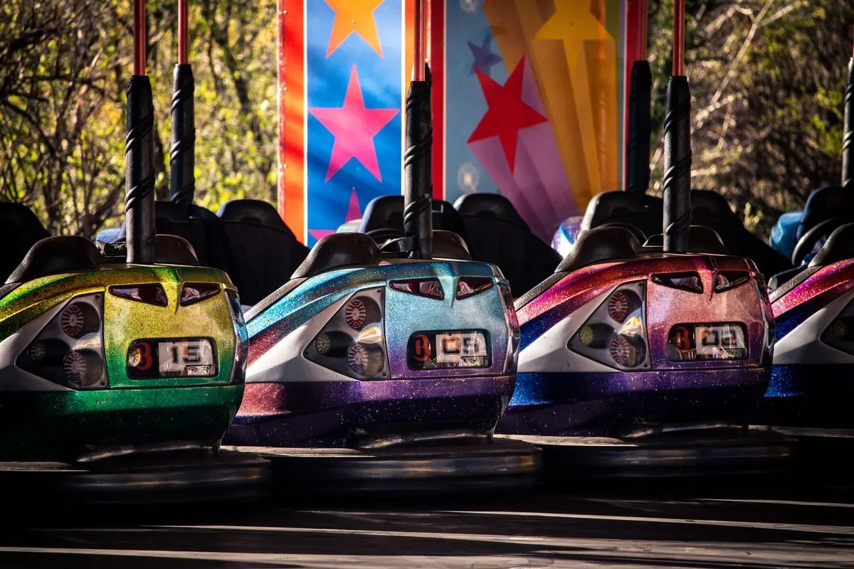 Row of colorful bumper cars parked side by side