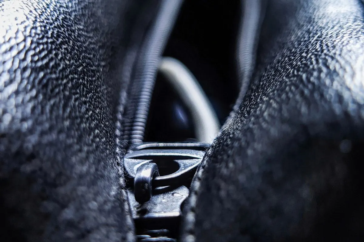 Black coil zipper on a leather jacket